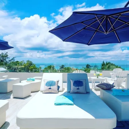 7 Mile Beach Private Beach Club. Ocean views from Roof Terrace and Pool Pavilion