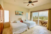 Luxury condo rooftop pool with 360° ocean views