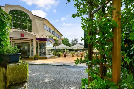 Logis Hôtel & Restaurant Ludik Отели в г. Сен-Лоран-Де-Винь