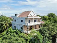 Realkhom Homestay Отели рядом с достопримечательностью «Roluos Group»