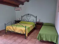 Near the sea, in a typical farmhouse surrounded by orange trees with pool, BBQ.