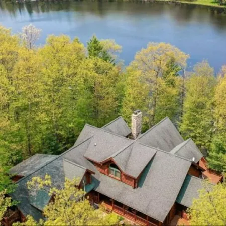 Luxury 7,500‑ Lakefront Lodge, Private Dock & Snowmobile Access