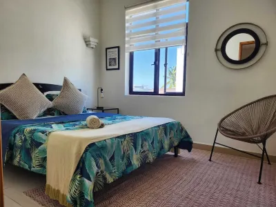 Cosy Penthouse vue mer et son Rooftop Privatif vue sur le Coin de Mire! Отели в г. Перейбера