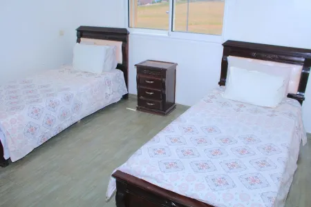 Un Très Grand Appartement Avec 3 Chambres Отели в г. Бен-Слиман