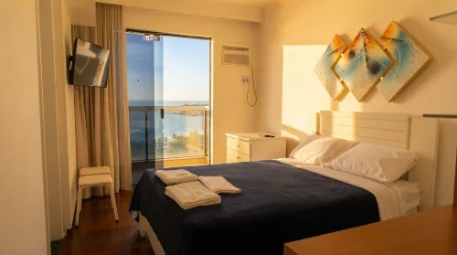 Apto Beira-mar com Garagem na Praia da Costa - 2 ดาว