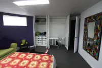 Gandhi: Very Large Room Decorated in Indian Style, Office Space and Sofa