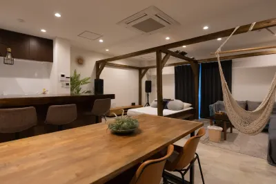 Roof Balcony with BBQ and Jacuzzi Projector Equi Hotels in Nakijin