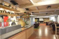 Persey Flora Apartments - bar