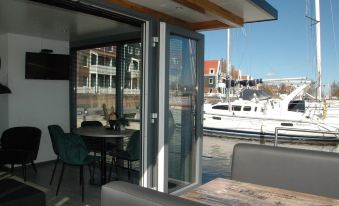 Beautiful Houseboat in the Harbour of Volendam Near Centre