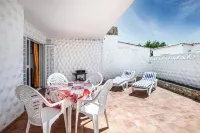 Apartment Near the Beach with a Huge Terrace Patio, Wifi and Parking