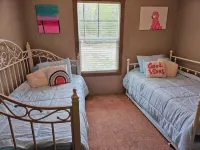 Charming, private 3-BR home in lovely Coldspring with WiFi and fenced yard.