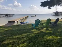 Lakefront getaway with white sand, clear water, gorgeous sunsets