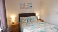 Two Bedroomed Holiday Cottage With Sea Views just one mile from the beach