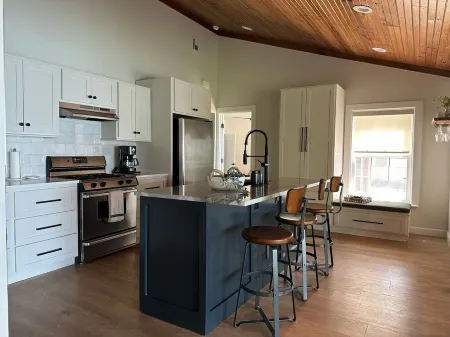 Newly Renovated 4B, 2.5 bath Lakefront home with South Grand Lake Views and dock