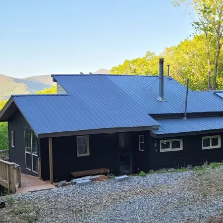 Cozy cool cabin in the mountains with a view Close to Downtown with a hot tub