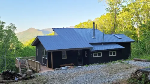 Cozy cool cabin in the mountains with a view Close to Downtown with a hot tub