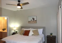 Cozy ground level resort style condo, w/ heated pool/hot tub, gym and discounts!
