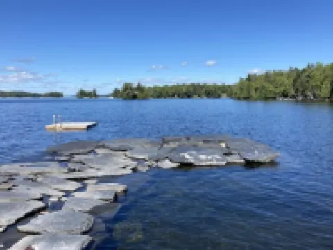 Beautiful lakefront camp with sunset view over big moose mountain 格林維爾酒店