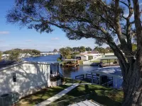 PETS STAY FREE Canal Front 3 bed/2 bath single family ample parking