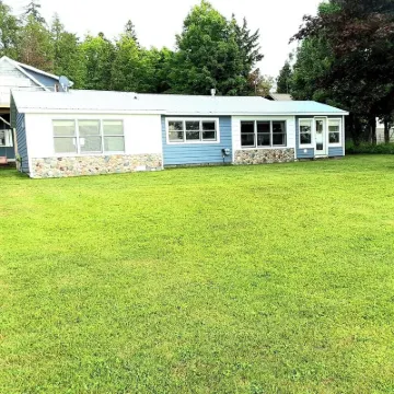 Beautiful Huron Bay sunsets from your own private beach.