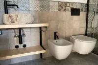 Lake view apartment with large hydromassage tub directly in the bedroom.