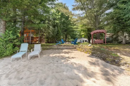 Higgins Lake Private Beachfront Home w/Dock, Boat Mooring, Sunset & Sunrise View