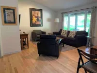 New 2 BR condo & private courtyard. CLEAN. Modern Kitchen. Walk/bike to town. Hotels in Douglas