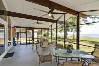 Quaint waterfront home with private beach