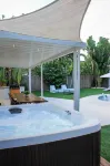 A beautifully renovated private home with a large backyard, Pool, and Hot Tub