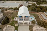 Second row, easy beach access, views and a pool