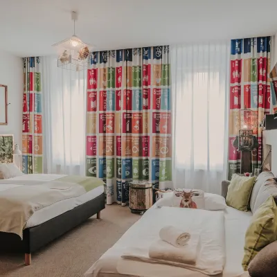 Boutiquehotel Stadthalle Отели рядом с достопримечательностью «14. Пенцинг»