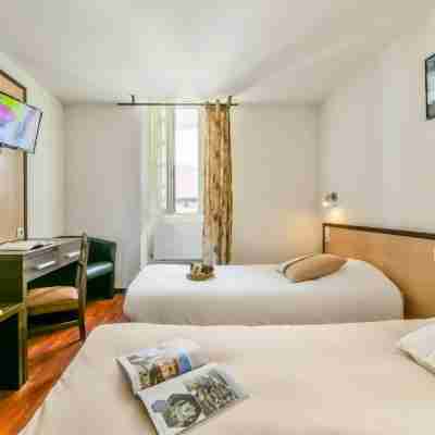 Logis Hôtel le Commerce Rooms