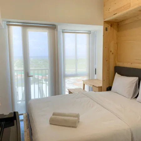 Minimalist Studio Room at Tokyo Riverside Pik 2 Apartment