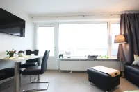 Absolute top location with sea view, balcony, W-Lan, top equipped