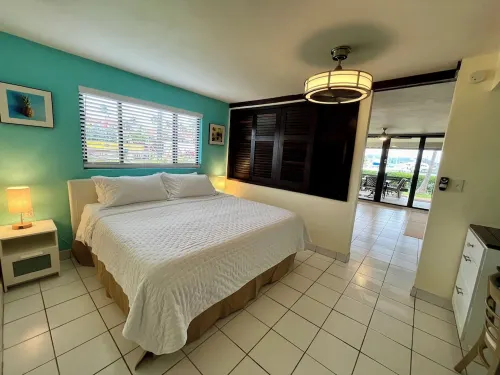 Paradise Awaits! Ground level unit with incredible views, pool, & beach access!