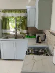 1 Modern A/C apartment with pool. Walking distance from beach, shop & restaurant