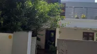 Cozy Glass Villa home. Five minutes walk to the happening Varkala cliff Hotels in Varkala Beach