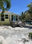 Yellow House with Dock on Deep Water Canal and Dock Power