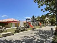 Malecon Beach House with beautiful backyard. Steps from the Caribbean ocean.