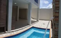 Apto inteiro Seguro e Confortável com piscina Hotels near PRACA DO PASSARINHO