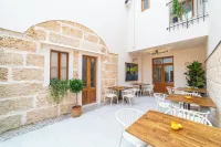 Flor de Mandarina Hoteles en La Puebla