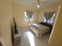 Charming Little River Duplex 1BR/1BA with Patio & Parking 15min to Beach Hotels in West Little River