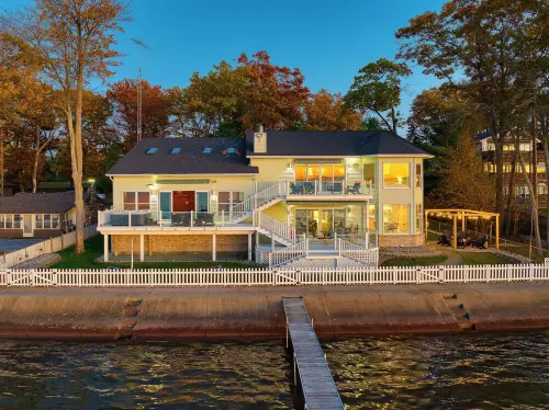 6BR Houghton Lake House w/ Indoor Pool, Hot Tub, and Golf Simulator - Sleeps 24