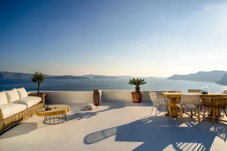 Delfini Villas Отели рядом с достопримечательностью «Скала Скарос»