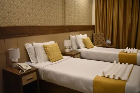 Snood Al Narjis Hotel Отели рядом с достопримечательностью «King Abdullah Library»