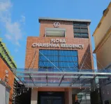 Flora Charishma Residency Aluva Hotels near Kodikuthumala Panchayth Ground