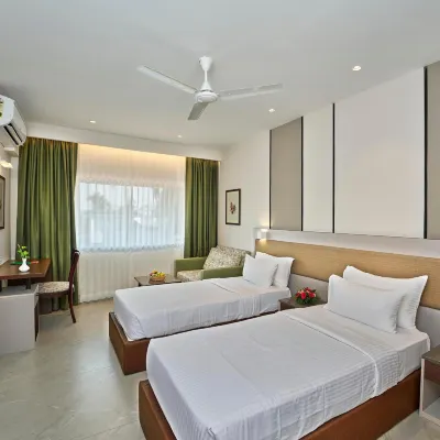 Abad Fort Hotels near Metro Aluva Railway Station