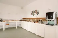 Pnoi Hotel - Desayuno