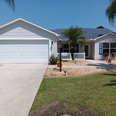 Paradise Village home in perfect golfing and recreation center location.