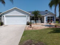 Paradise Village home in perfect golfing and recreation center location.